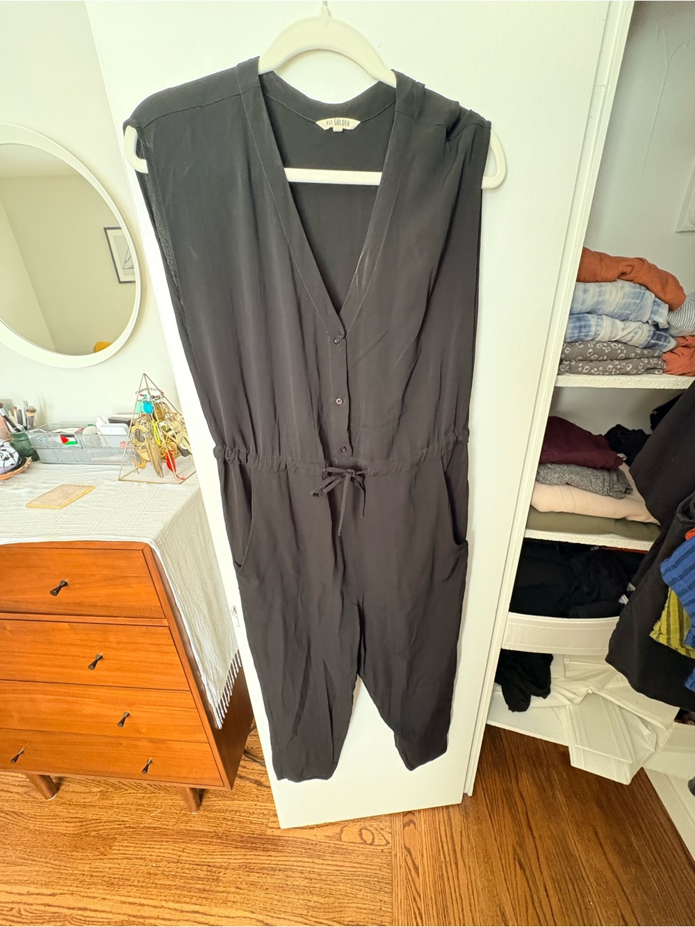 Ali Golden Sleeveless Black V-Neck Drawstring Jumpsuit